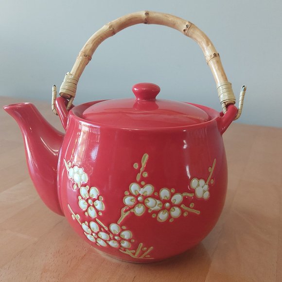 Red teapot with cherry blossom design in white with tan accent bamboo handle - Picture 3 of 12